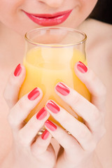 Obraz na płótnie Canvas sweet woman with glass of juice