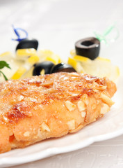 tasty chop served in white table close up