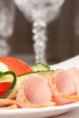 meat cut and served with vegetables