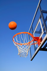 Basketball Shot Heading Toward the Hoop, Blue Sky