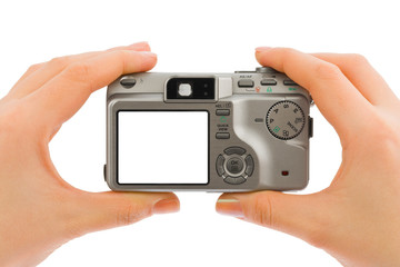 Photo camera in hands