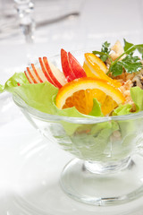 salad with apples and nuts close up