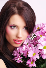 young woman face with flowers