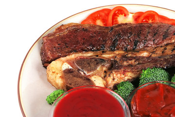 steak and red hot sauces