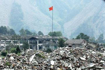 The Chinese national flag on the ruins