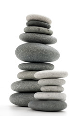 Fototapeta na wymiar image of balancing stones over white - vertical picture