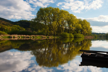 Punt and Reflection On The River
