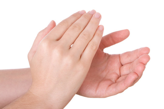 Hands applauding isolated on a white background.