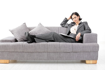 Businesswoman sitting in sofa