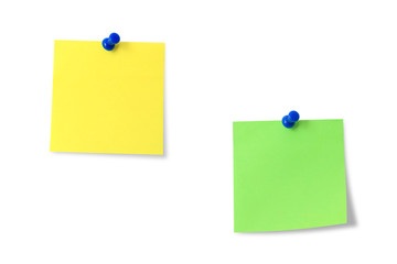 A yellow and green sticky note on a white background.