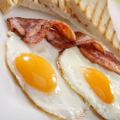 Breakfast - toasts, eggs, bacon