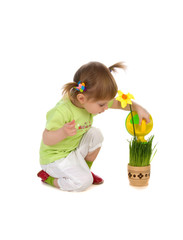 Cute girl watering the flower
