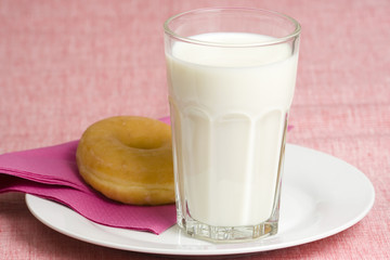breakfast glass of chocolate milk and donut