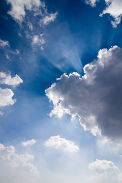 Sun rays through clouds - photo of amazing sky