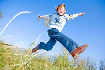 Happy jumping boy