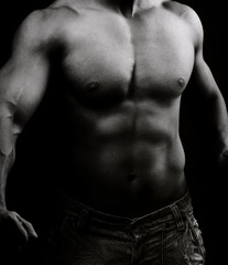 Fototapeta na wymiar Artistic image of muscular male body