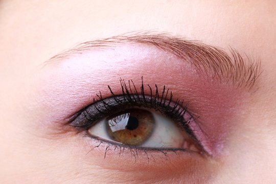 female eye with makeup close up