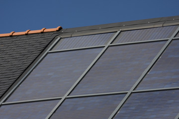 many solar cells on a roof