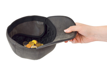Hand and cap with money