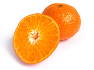 Organic Tangerine cut in half, on white background
