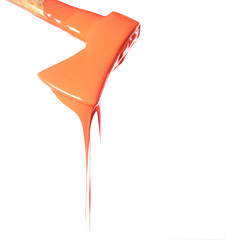 Axe in a dense orange color liquid.