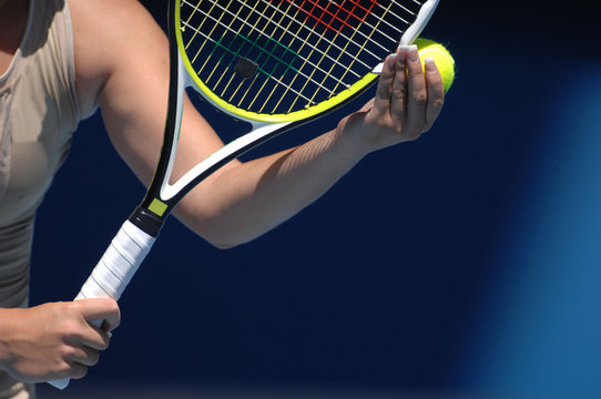 A Woman With Beautiful Hands Is Holding A Tennis Ball