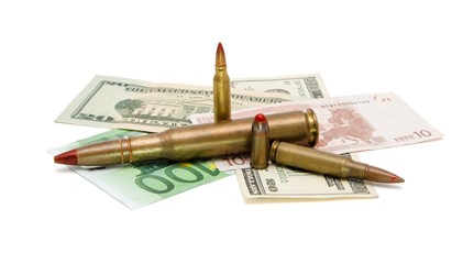Money and cartridges on white background
