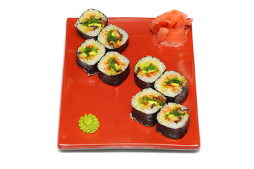 Japan rolls with ginger and wasabi on the red plate
