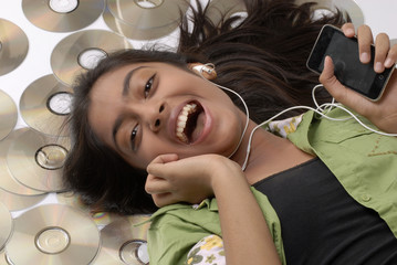 girl lying on audio music cd