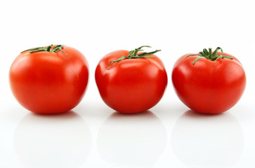 Three Ripe Tomatoes Isolated on White