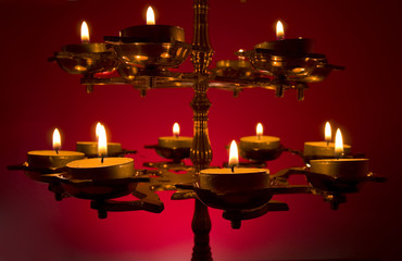 Close-up of a Beautifully Lit Lamp on a Deep Red Background