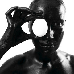 Made up black woman with egg