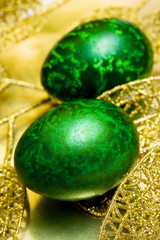 Easter egg with golden leaves