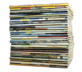 Heap of multi-coloured old magazines