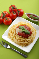 Italian pasta spaghetti with tomato sause and parmesan.