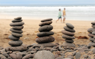 balance volcanic pebbles in the beach