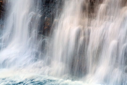 Waterfall on mountain forest © wildman