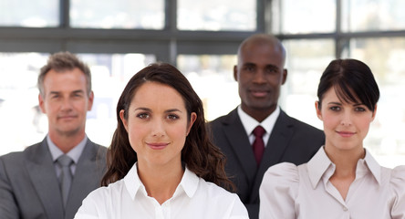 Potrait of a confident business woman leading a team