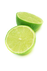 Two halves of lime isolated on white.