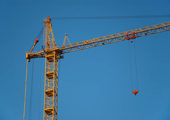 The crane on a background of the sky