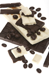 Dark and white chocolate on white background