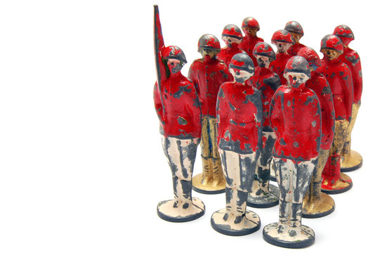 Old toy soldiers isolated on white background