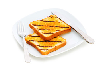 Freshly toasted bread in the white plate