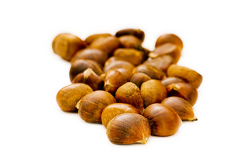 Many chestnuts isolated on the white background