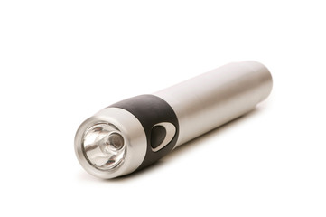 Small flashlight isolated on the white background