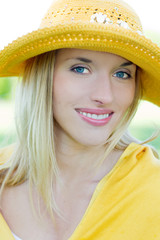 Portrait of smiling woman in hat