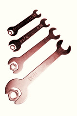 Spanners and nuts on white