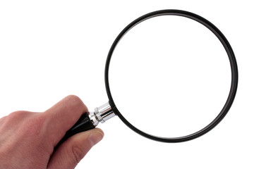 Hand holding a magnifying glass. Including clipping path