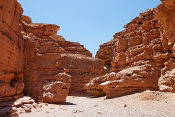 Desert landscape of weatherd red rocks in Red Canyon, Israel