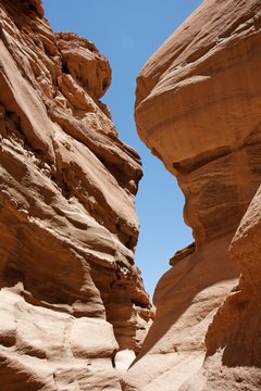 Narrow slot between two rocks in Red Canyon, Israel